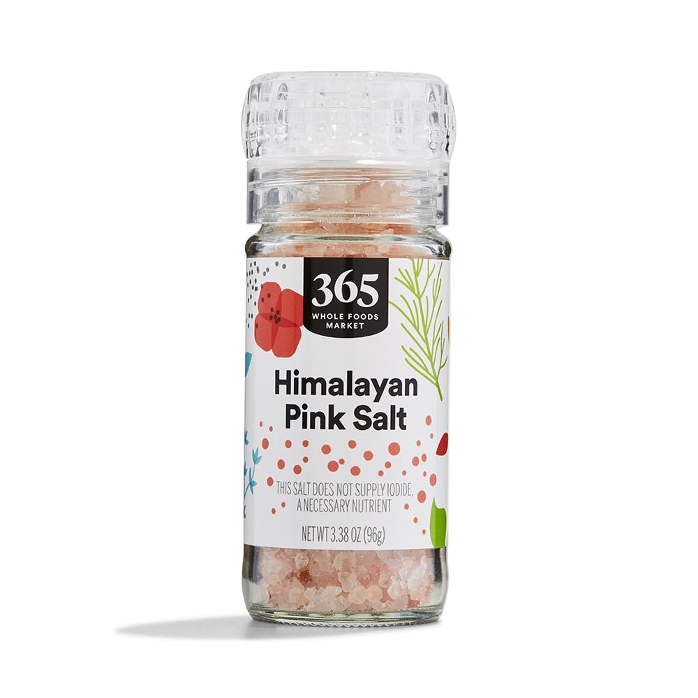365 by Whole Foods Himalayan Pink Salt Grinder seen from the front, ideal for table seasoning.