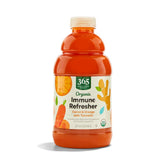 365 by Whole Foods Market organic carrot orange turmeric juice bottle on counter, ideal for daily refreshment