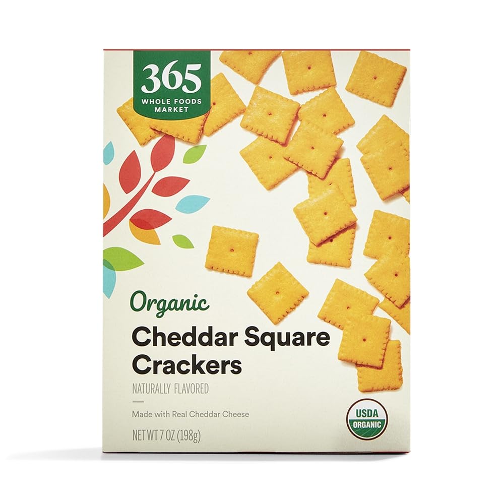 365 by Whole Foods Market Organic Cheddar Squares packaging shows a convenient 7-oz tray for on-the-go snacking.