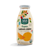 365 by Whole Foods Market organic lemon juice bottle adds bright flavor to recipes.