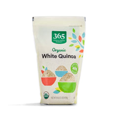 365 by Whole Foods Market organic white quinoa packaging on kitchen counter, ideal pantry staple.