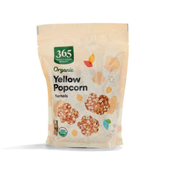 365 by Whole Foods Market organic yellow popcorn kernels in packaging, ideal for snacking.