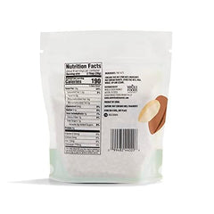 Close-up of 365 by Whole Foods Market pine nuts, perfect for enriching sauces and toppings.
