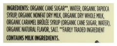 365 by Whole Foods Organic Salted Caramel Sauce being poured from glass bottle.