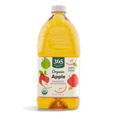 365 by Whole Foods Market organic apple juice bottle on a kitchen counter, ideal for family meals.