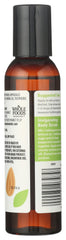 Close-up of 365 almond oil label showing natural ingredients and standards