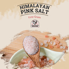 52USA Himalayan pink salt fine grain being dispensed for seasoning