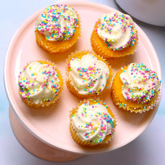 A Great Surprise sprinkles on cookies and cupcakes for festive flair.