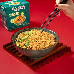 A-Sha Spicy Mala noodles served in a steaming bowl