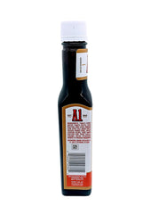 A.1 Thick & Hearty bottle pours to enhance steak with savory glaze.