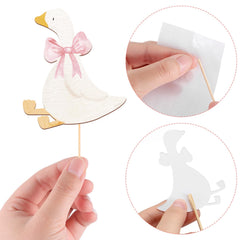 AceOrbit goose topper with sticks for easy cake insertion and neat presentation.