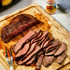 Beef dish featuring Adolph's Seasoned Tenderizer ready to cook.
