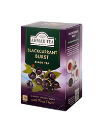 Hot brew of Ahmad Tea Blackcurrant Burst, bright berry aroma.