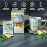 Ahmad Tea Detox tea bag with ginger for warming flavor and comforting afternoon sip.