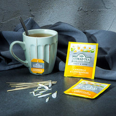 Hot or iced Ahmad Tea brew in a warm amber cup.