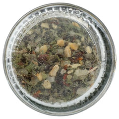 Alessi grinder-topped glass jar highlighting fresh-ground spice oils.