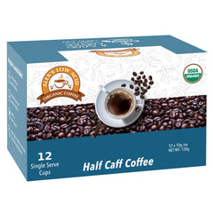 Steaming cup of Alex's Low Acid Half Calf coffee with inviting aroma.