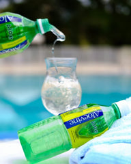 Serving glass of Aloevine Aloe Vera Drink Original for year-round refreshment.