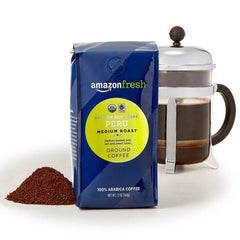 Amazon Fresh Arabica Peru 100% beans close-up promising a smooth cup.