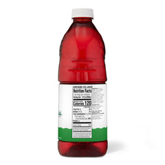 Pouring Amazon Grocery Cranberry Apple Juice Cocktail into a glass for quick refreshment