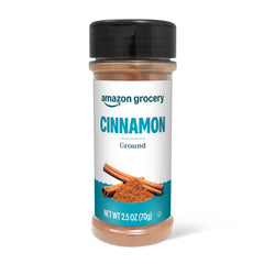 Amazon Grocery ground cinnamon bottle offers convenient seasoning for meals.