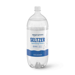 Amazon Grocery seltzer water bottle pour shows refreshing hydration with meals