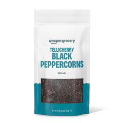 Amazon Grocery Tellicherry whole peppercorns in a 16 oz bag, ideal for grinding.