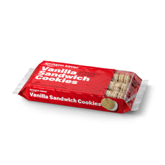 Vanilla Sandwich Cookies enjoyed with milk; Amazon Saver brand.
