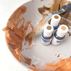 AmeriColor Warm Brown cap close-up indicating precise dispensing.