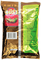 Amira tamarind candy on a desk, office-friendly snack with sour-sweet allure.