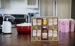 Amish Country Popcorn canola oil bottle, ideal for perfect stovetop popping.
