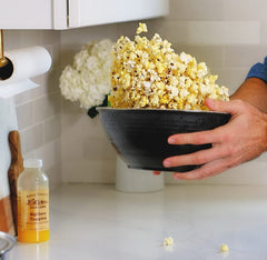 Amish Country Popcorn fine white salt in a bowl ready for snacking.