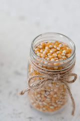 Amish Country Popcorn kernels popping in a pot for a warm snack