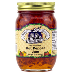 Amish Wedding hot pepper jam jar with spoon glaze on grilled cheese.