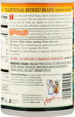 Plate with Amy's Organic refried beans and toppings suggests authentic tacos