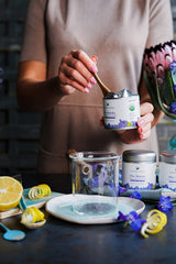 Ancient Choice blue matcha tin canister on shelf highlights sustainable, reusable packaging.