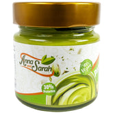 Anna and Sarah pistachio butter cream jar showing premium pistachios and cream texture.