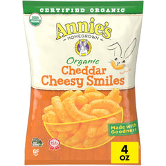 Annie's Cheddar Cheesy Smiles puffs in a pack, gluten-free snack option