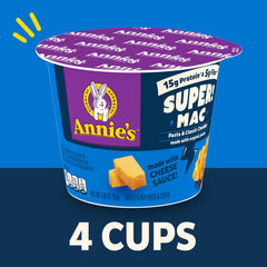 Cheddar sauce being poured over Annie's Super! Mac noodles.