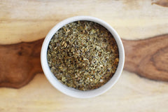 Anthony's Organic Dried Basil Leaves in a glass jar display.