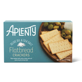 Aplenty olive oil flatbread crackers on a board, perfect for cheese pairing.