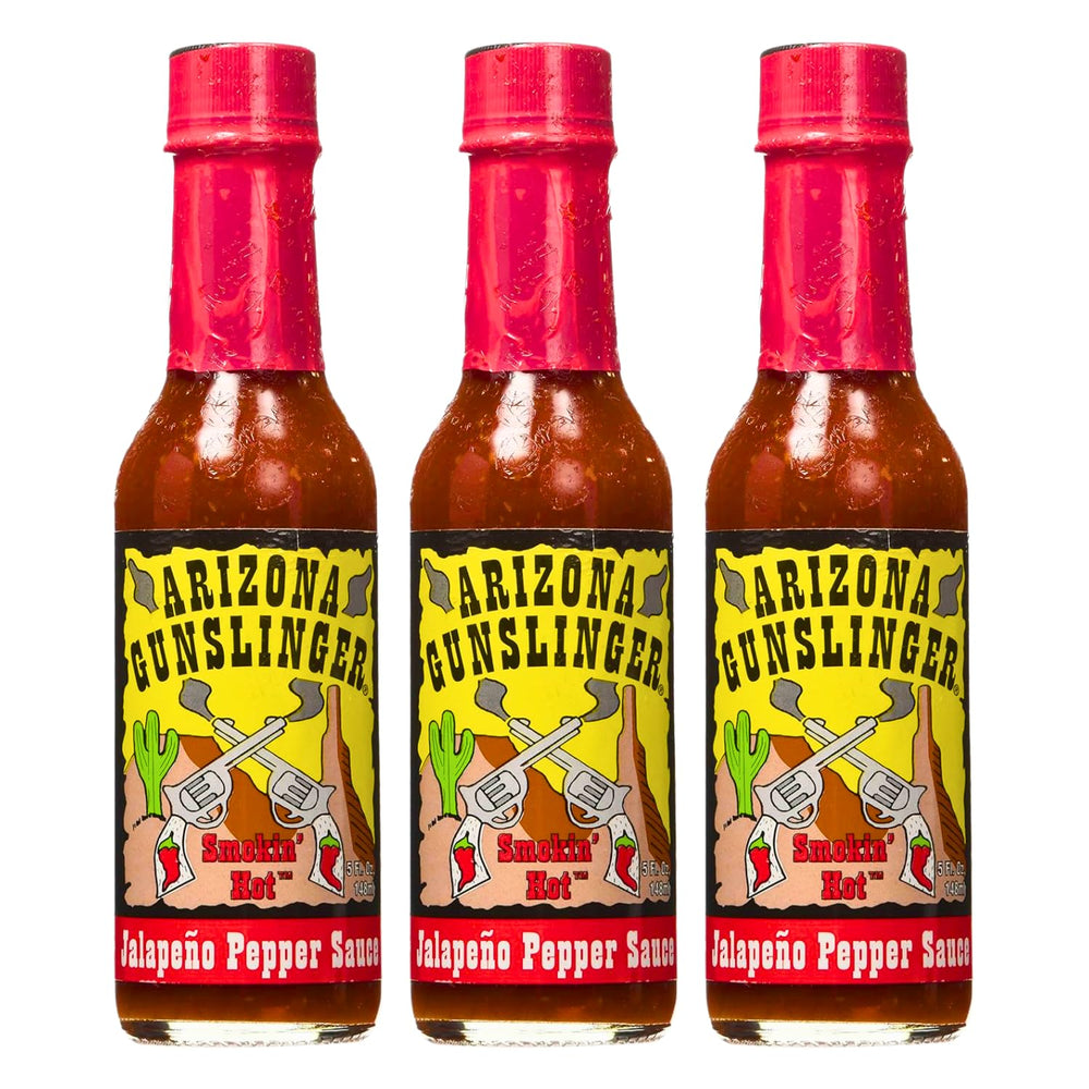 Arizona Gunslinger Red Jalapeño Sauce bottle close-up, bold flavor for tacos.