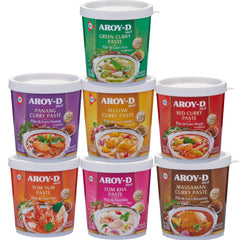 Aroy-D yellow curry paste served with a vibrant curry dish.