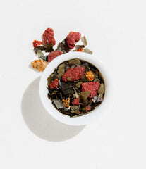 Pyramid bags of Art of Tea Organic Happy Tea ready to brew