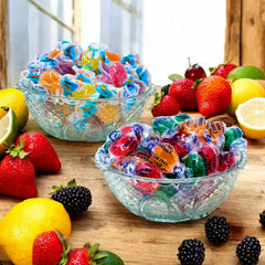Assortit individually wrapped candies closeup emphasizes freshness and portability.