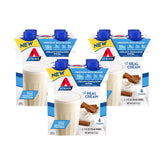 Atkins Creamy Cinnamon Swirl bottle showing on-table nutrition note for 15g protein