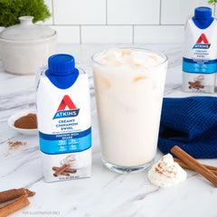 Close-up of Atkins Creamy Cinnamon Swirl cream texture and cinnamon swirl