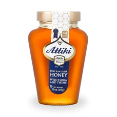 Attiki Pure Greek Honey jar front with wild flora, ideal for drizzling on feta