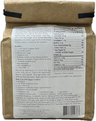 Authentic Foods sorghum flour superfine in a measuring cup for precise gluten-free mixing