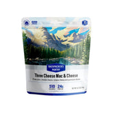 Backpacker's Pantry Three Cheese Mac & Cheese bowl on camp table for trail meals